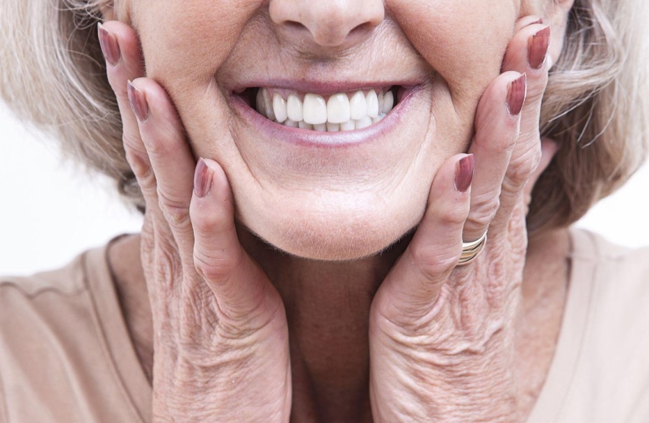 old women with new denture