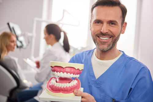 dentures-vs-implants